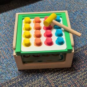 Vibrant Wooden Hammer and Peg Toy